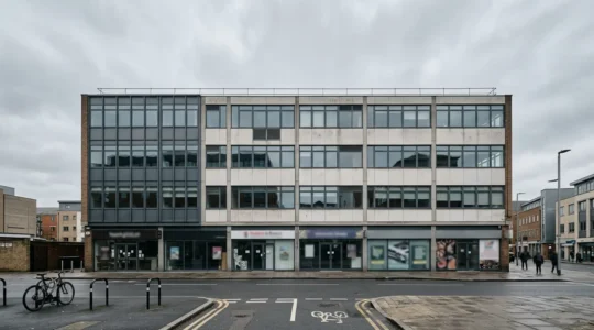 Modern office building with mixed architectural elements showing conversion potential in urban setting